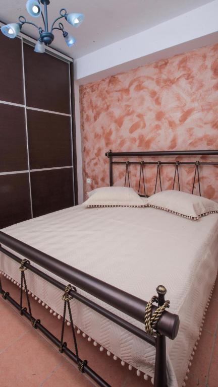 Postel nebo postele na pokoji v ubytování Marialena house