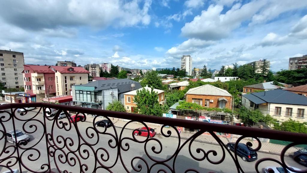 a view of a city from a balcony at Hotel Max Comfort in Kutaisi
