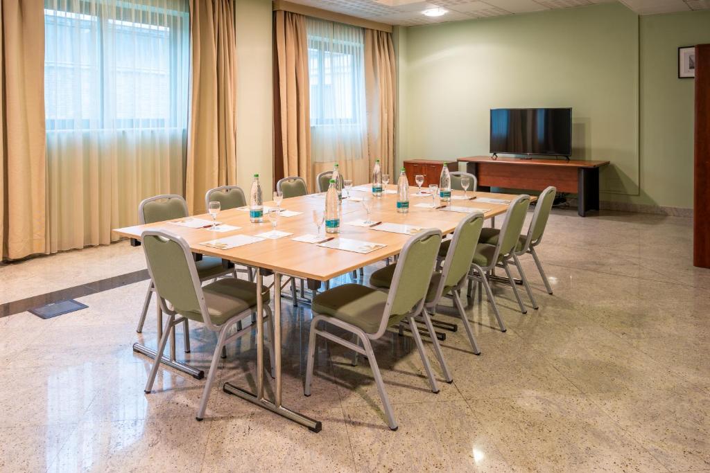 TV a/nebo společenská místnost v ubytování Hotel Parisi