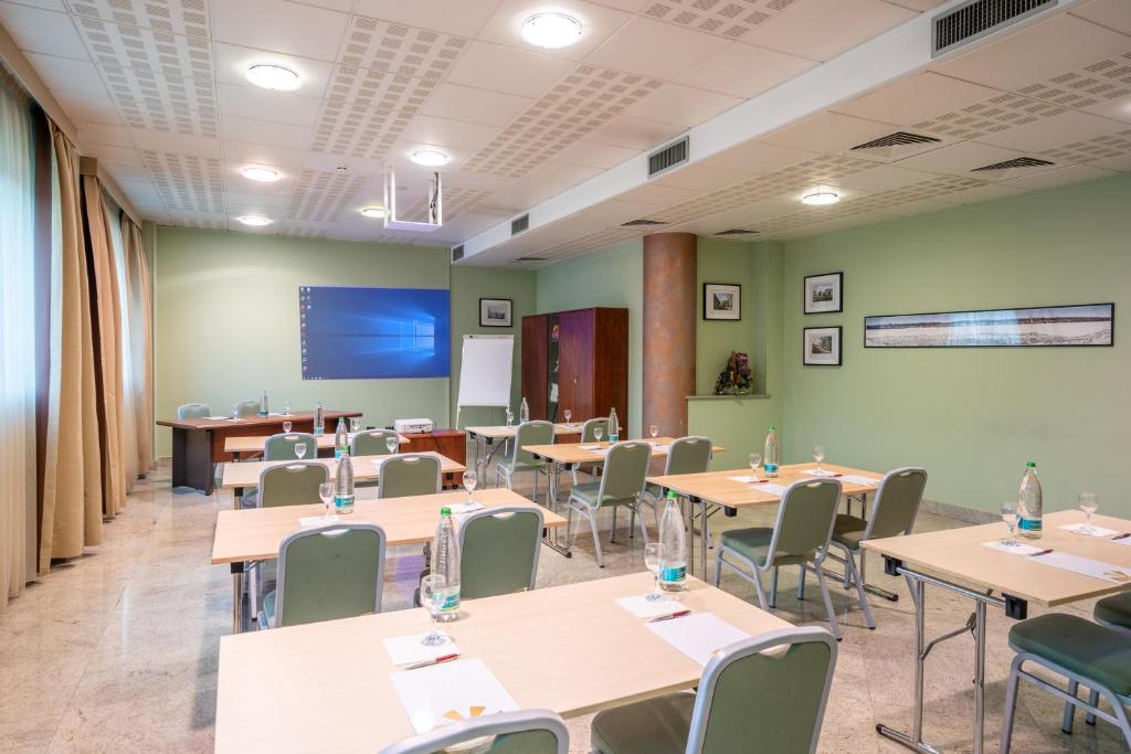 TV a/nebo společenská místnost v ubytování Hotel Parisi
