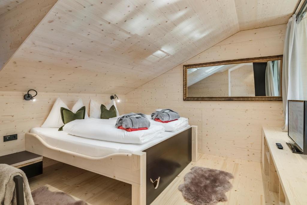 Postel nebo postele na pokoji v ubytování Hotel Jagdschloss Resort