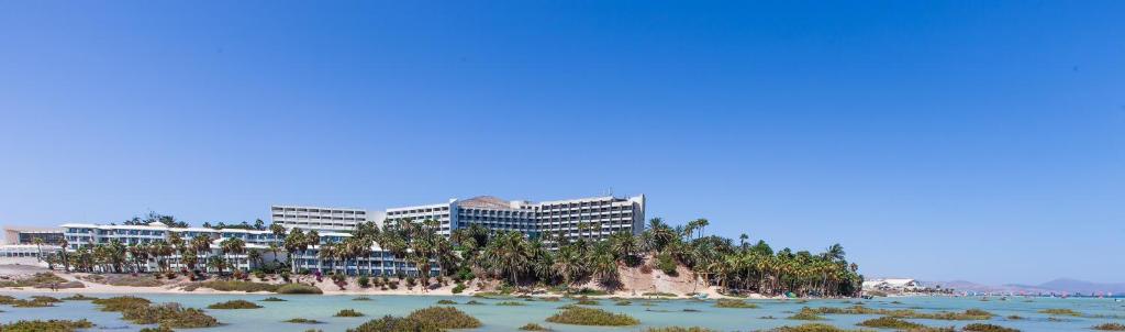 a view of a resort from the beach at INNSiDE by Meliá Fuerteventura – Adults Only in Costa Calma