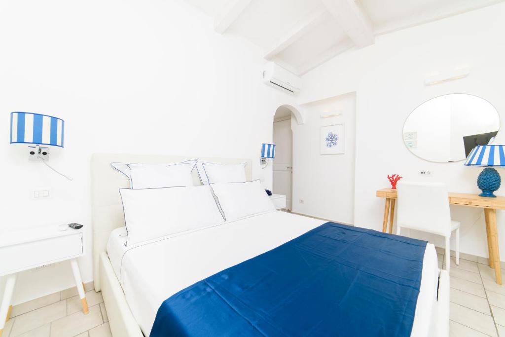 Letto o letti in una camera di Residenza Al Pesce D'Oro