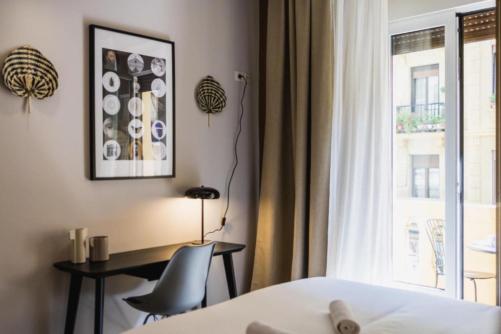 Posteľ alebo postele v izbe v ubytovaní ONDARRA by SWEET HOME SAN SEBASTIAN