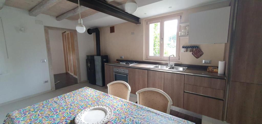 Kuchyň nebo kuchyňský kout v ubytování Casa vacanze Tredis
