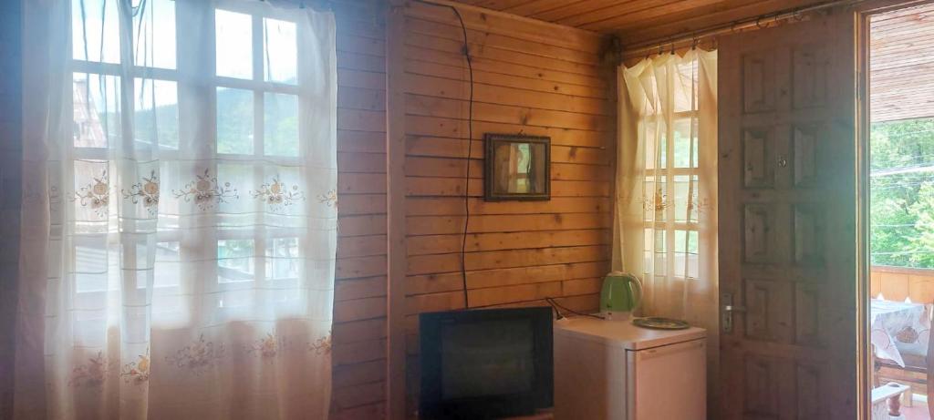TV a/nebo společenská místnost v ubytování Home near park