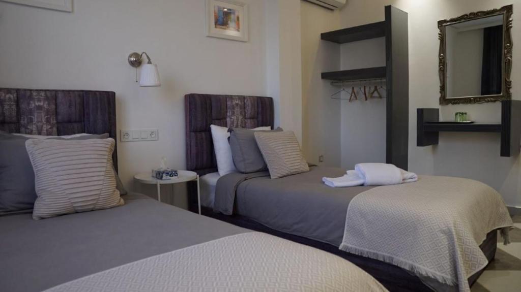Кровать или кровати в номере riad casa bahia asilah