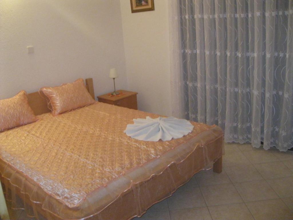 Posteľ alebo postele v izbe v ubytovaní Apartments Villa Macola