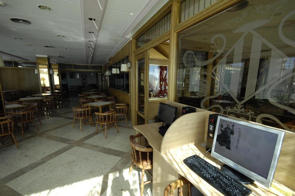 TV a/nebo společenská místnost v ubytování Hotel Marian Platja