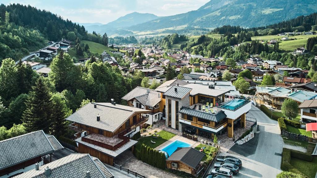 an aerial view of a house in a valley at Home suite home in Fieberbrunn