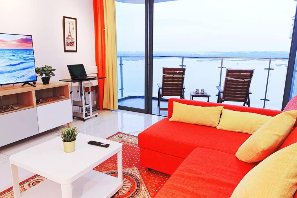 Χώρος καθιστικού στο 海滨度假屋 3BR Condo ~Walk to Beach @13pax #RoyalStrand