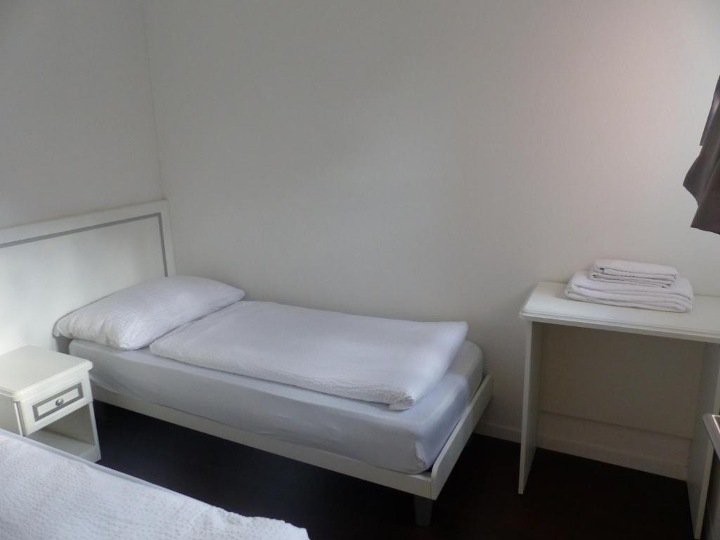 Postel nebo postele na pokoji v ubytování Plaza