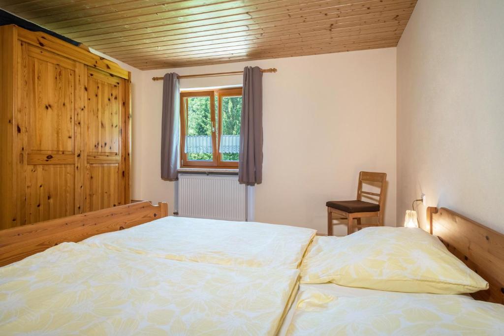 Postel nebo postele na pokoji v ubytování Tobelbach