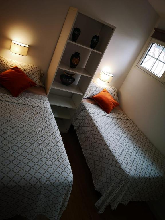 Postel nebo postele na pokoji v ubytování Casa Cosy Yumbo