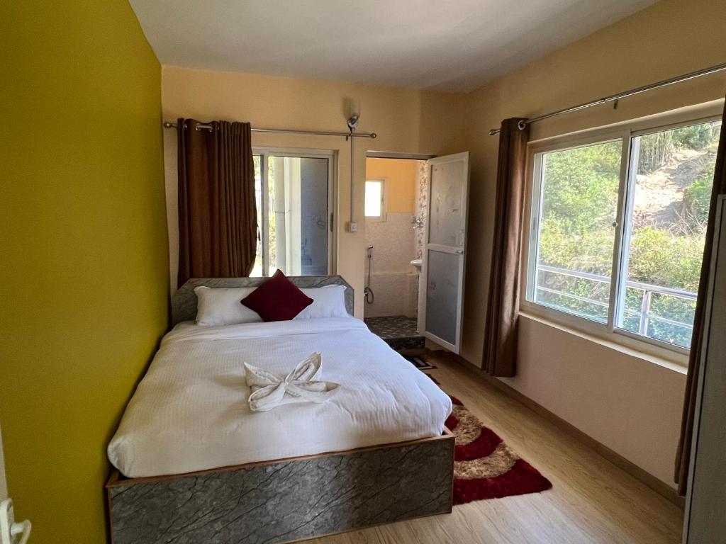 Postel nebo postele na pokoji v ubytování Hotel Village View Nagarkot