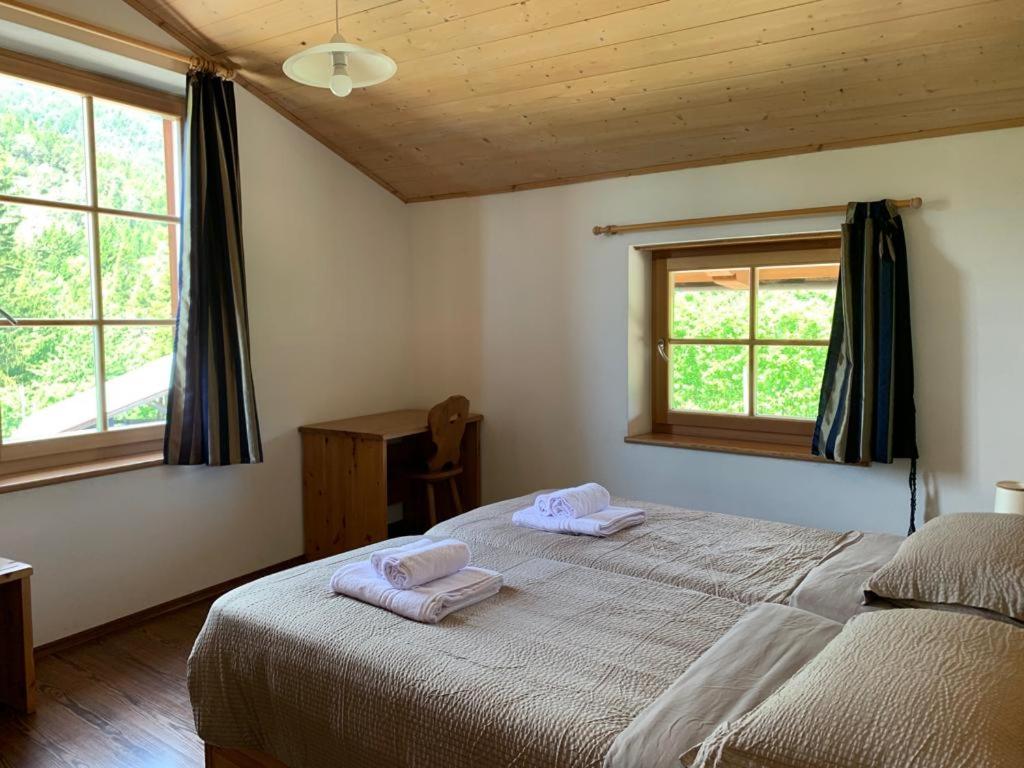 Posteľ alebo postele v izbe v ubytovaní Agritur Maso Forcola
