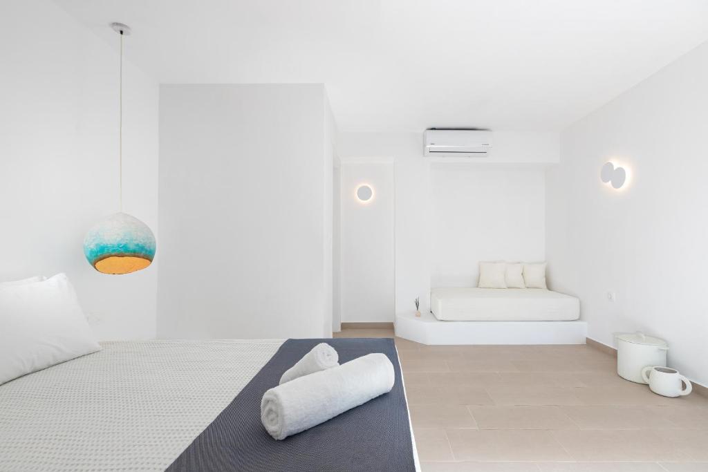 Postel nebo postele na pokoji v ubytování VOCA HOTEL & SUITES