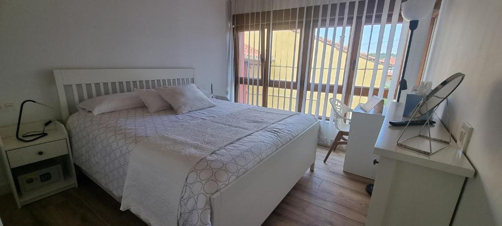 Postel nebo postele na pokoji v ubytování Apartamentos Les Texuques