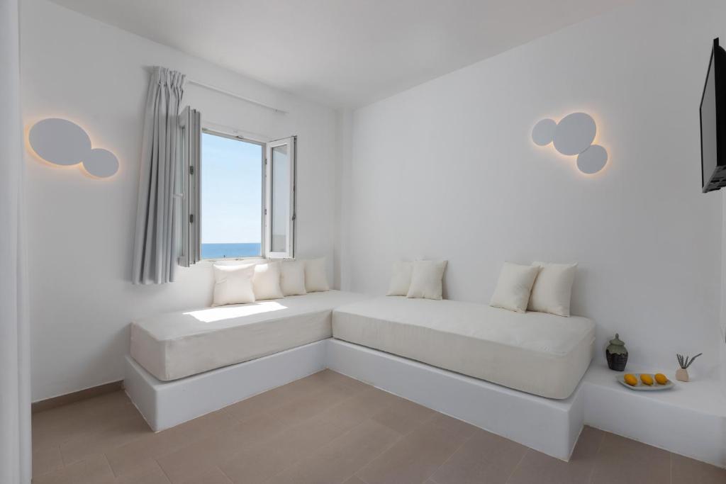 Postel nebo postele na pokoji v ubytování VOCA HOTEL & SUITES