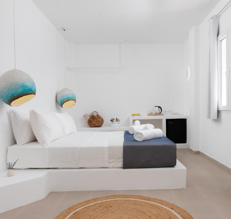 Postel nebo postele na pokoji v ubytování VOCA HOTEL & SUITES