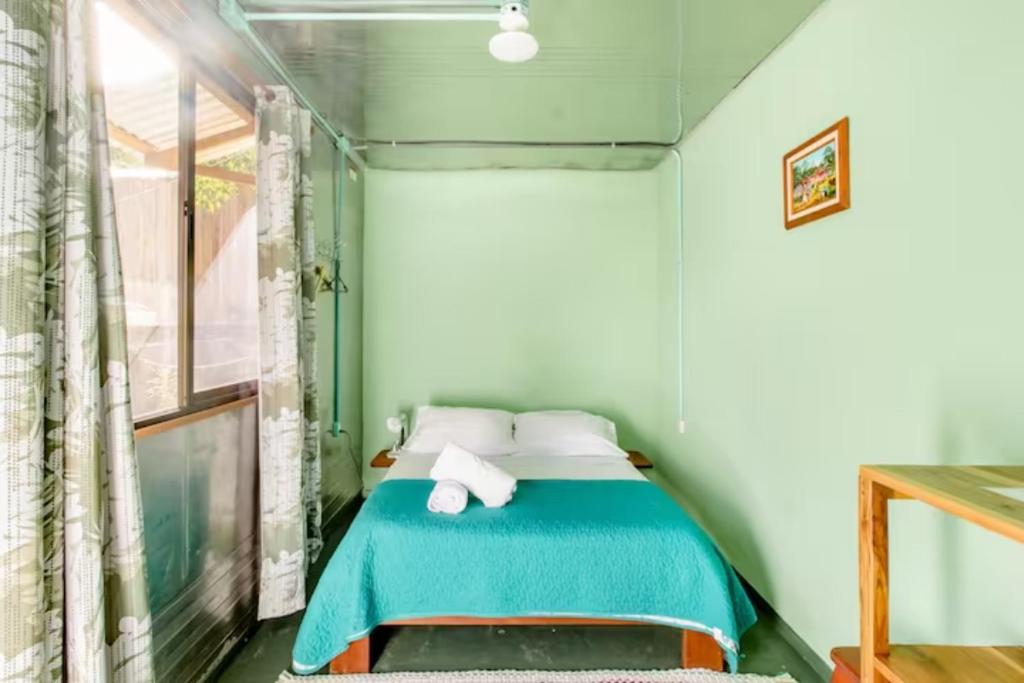 Postel nebo postele na pokoji v ubytování Container House Cahuita