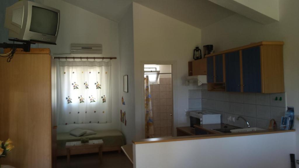 Kuchyň nebo kuchyňský kout v ubytování Galini Apartments
