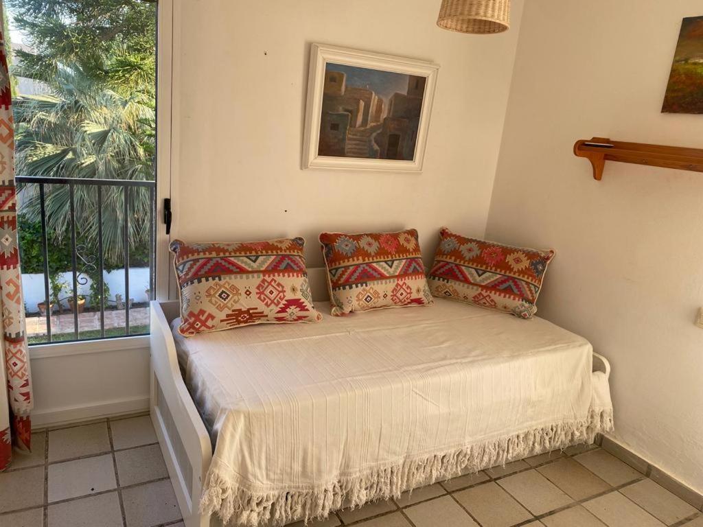 Posteľ alebo postele v izbe v ubytovaní CHALET PUERTO REY