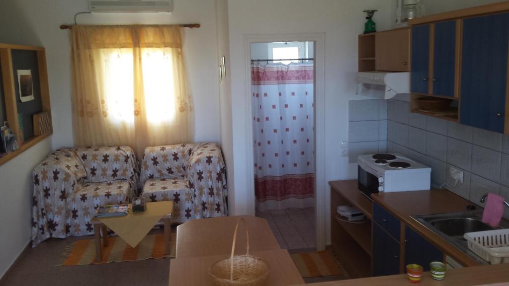 Kuchyň nebo kuchyňský kout v ubytování Galini Apartments
