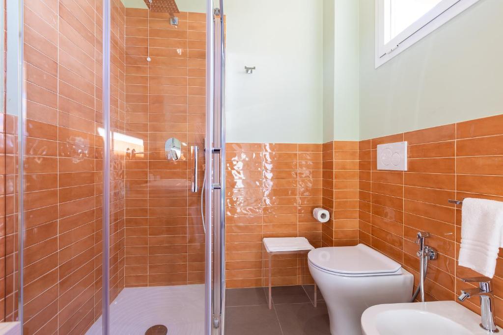 Koupelna v ubytování Fani Rooms