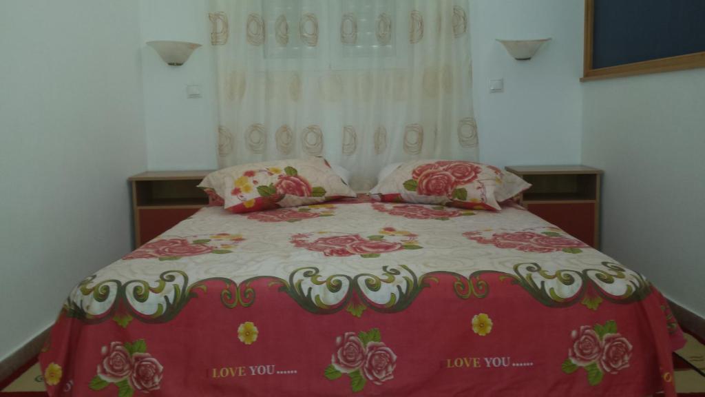 Postel nebo postele na pokoji v ubytování Galini Apartments