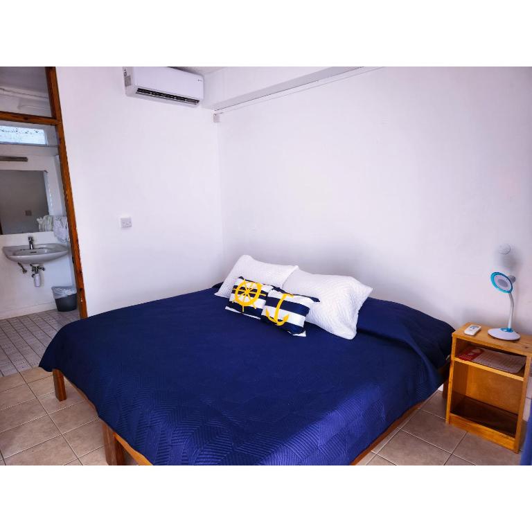 Postel nebo postele na pokoji v ubytování OEManagement Rooms