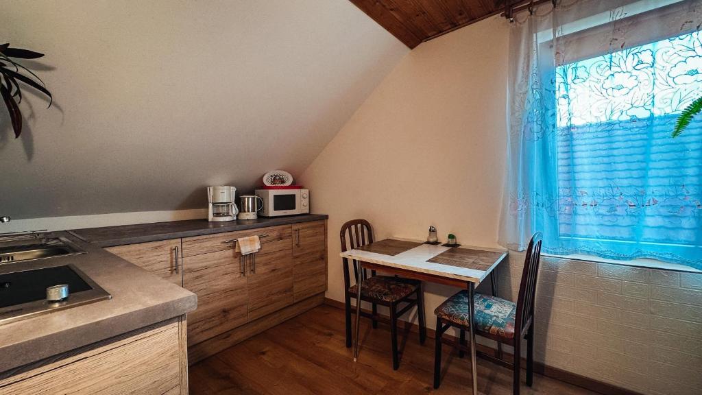 Kuchyň nebo kuchyňský kout v ubytování Napfény vendégház