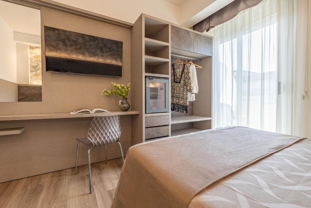 Postel nebo postele na pokoji v ubytování Hotel Cavour