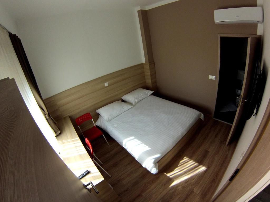 Postel nebo postele na pokoji v ubytování Sweet Dreams Rooms and Apartments Postojna