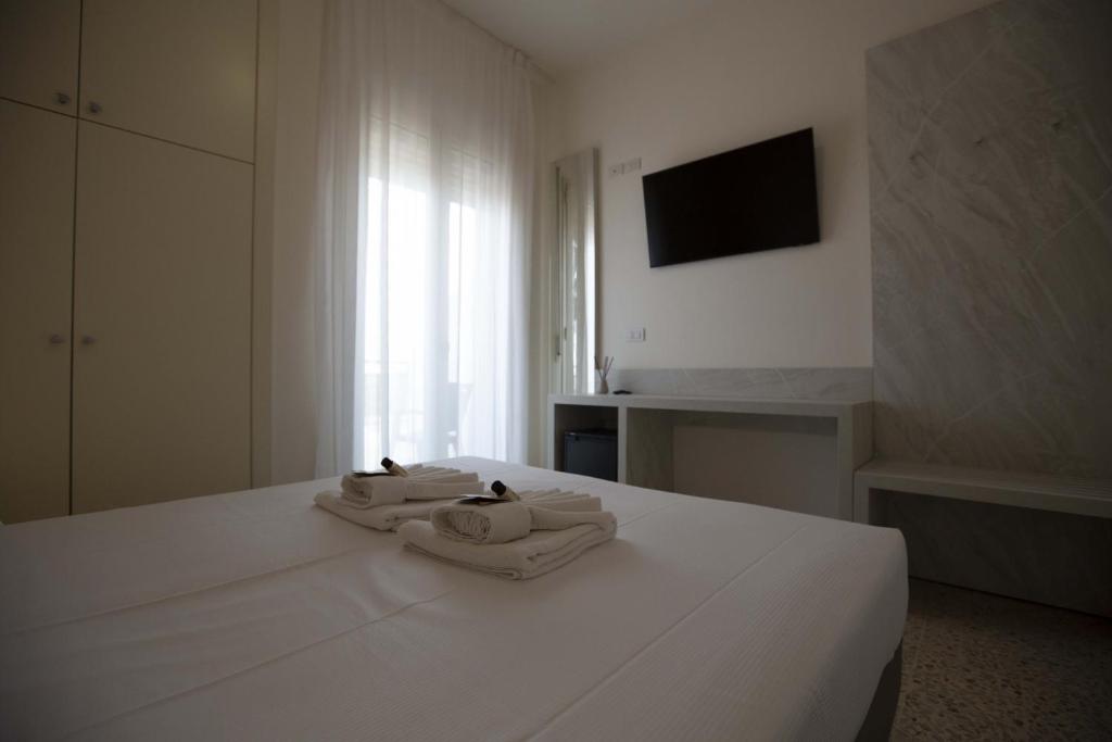 Postel nebo postele na pokoji v ubytování Hotel Confort