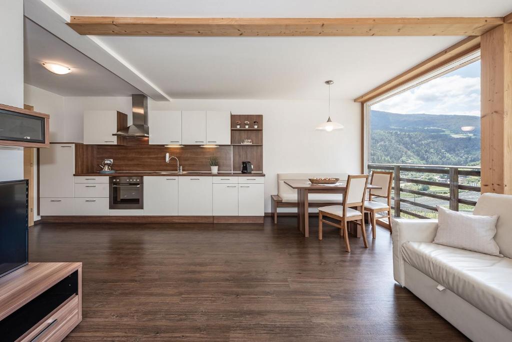 Kuchyň nebo kuchyňský kout v ubytování Appartements Toni