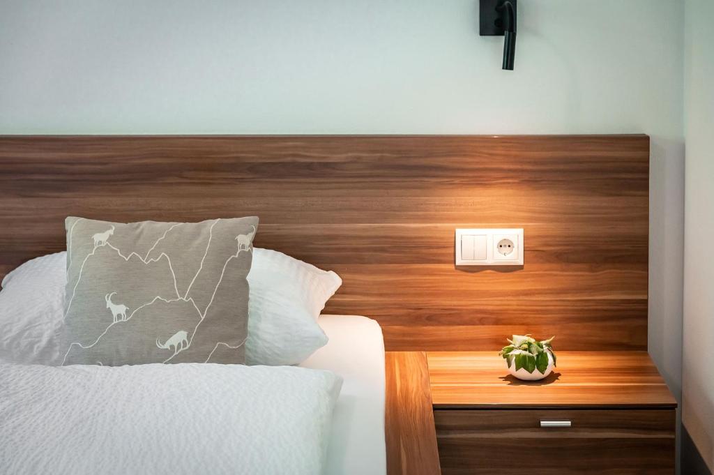 Postel nebo postele na pokoji v ubytování Appartements Toni