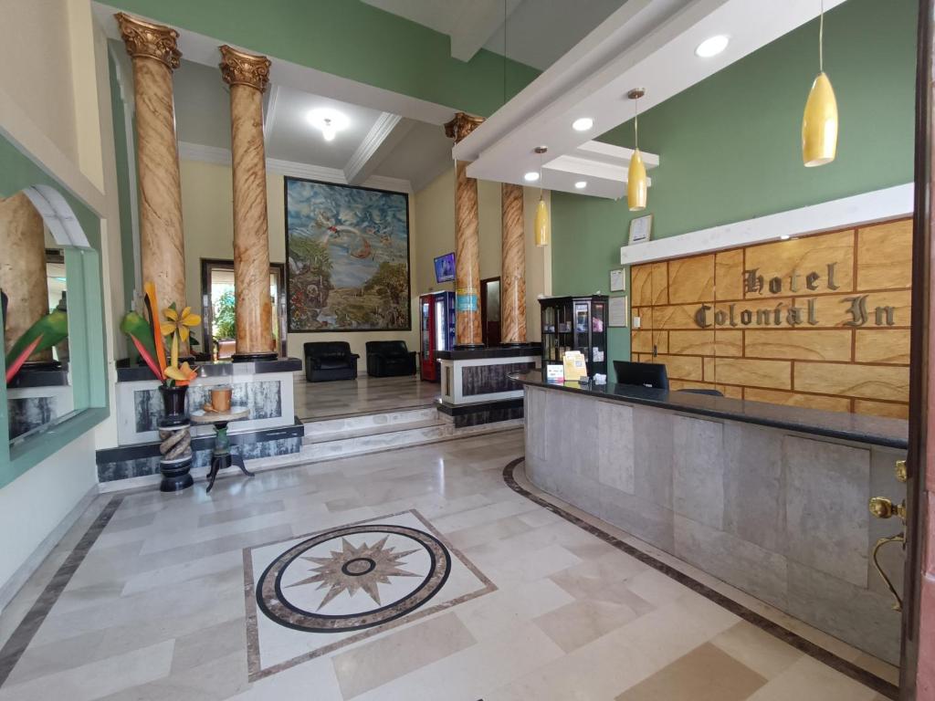 a lobby of a hotel with a hair salon at Hotel Colonial Inn in Barranquilla