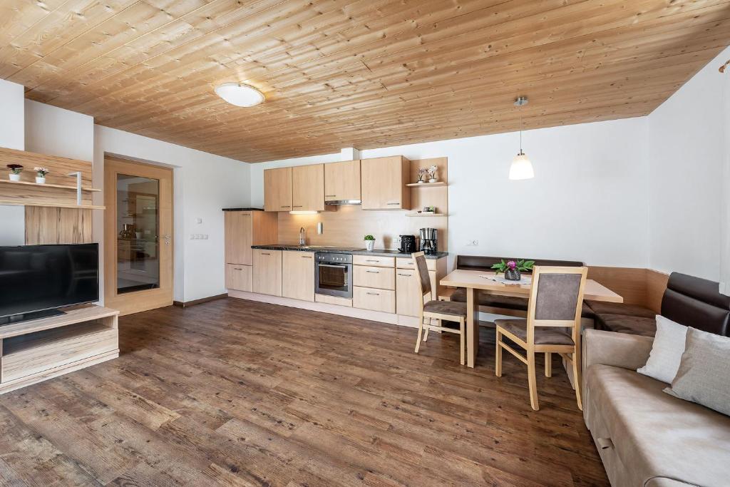 Kuchyň nebo kuchyňský kout v ubytování Appartements Toni