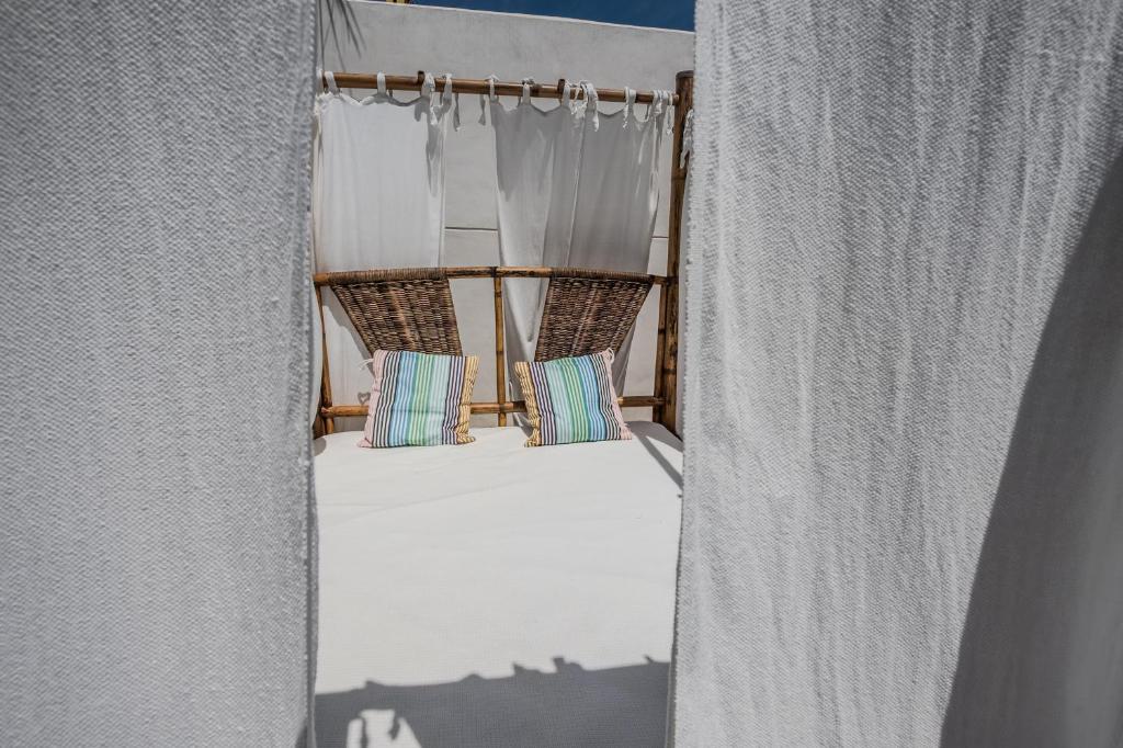 Postel nebo postele na pokoji v ubytování Levante by Mintaka Homes