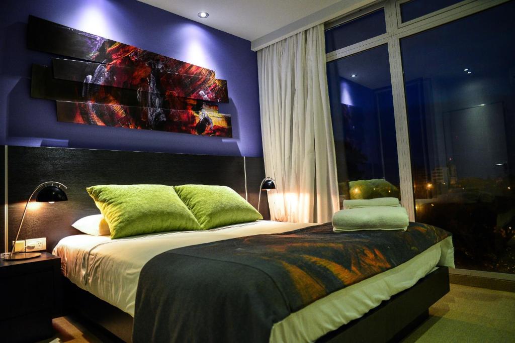 Ambit Boulevard Hotel Boutiqueにあるベッド