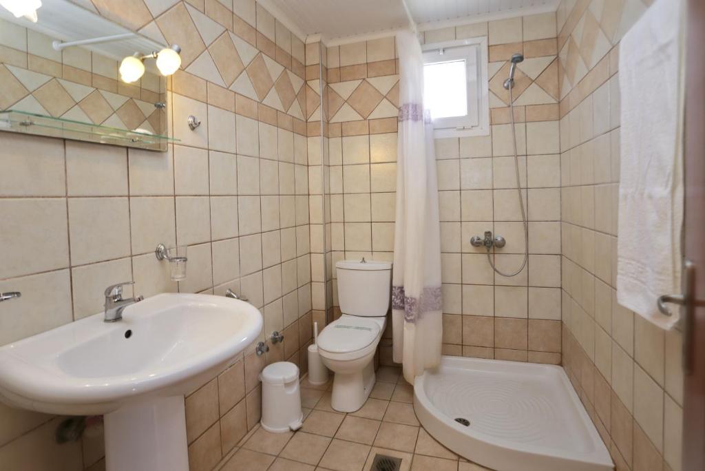 Koupelna v ubytování Kapahi Magic Hotel Apartments