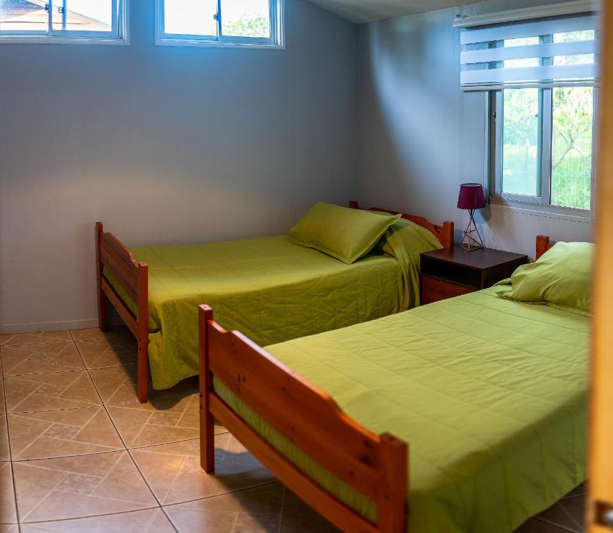 Postel nebo postele na pokoji v ubytování Cabañas Raupa