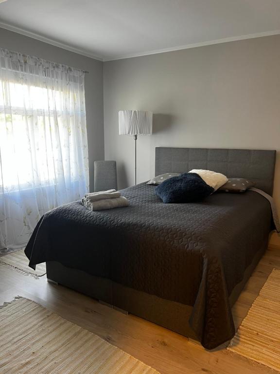 Postel nebo postele na pokoji v ubytování Kati Söögituba & Majutus