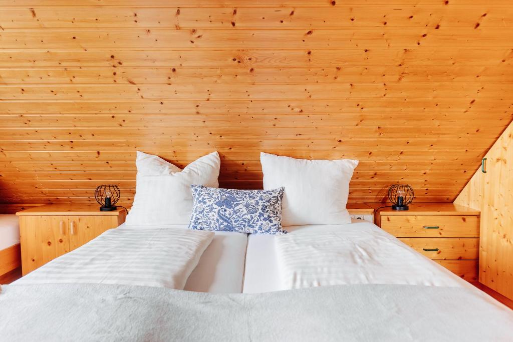 Postel nebo postele na pokoji v ubytování Ferienhaus Nora