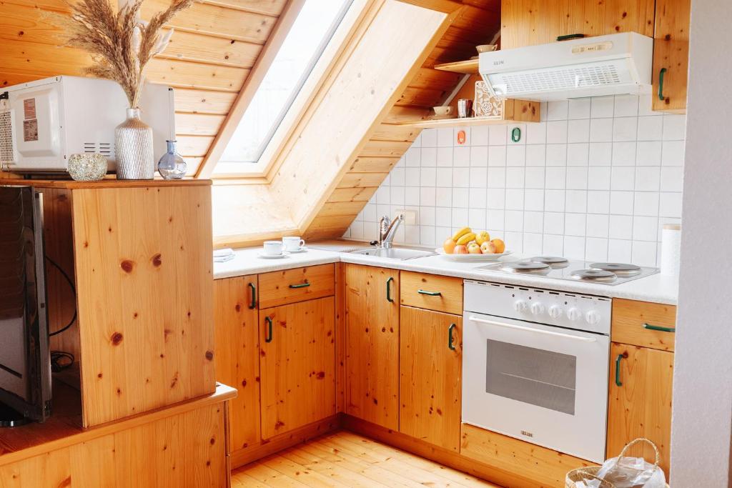 Kuchyň nebo kuchyňský kout v ubytování Ferienhaus Nora