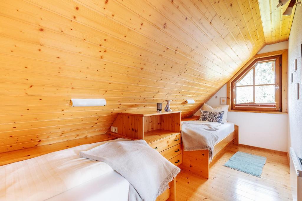 Postel nebo postele na pokoji v ubytování Ferienhaus Nora