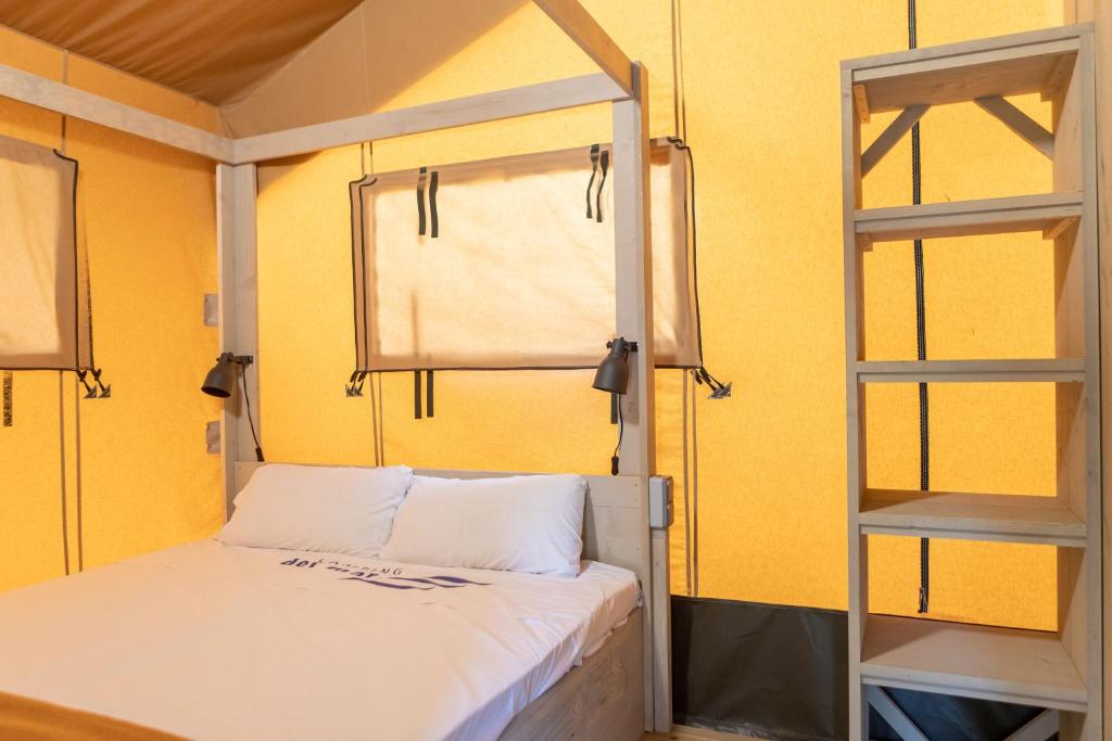 Postel nebo postele na pokoji v ubytování Camping Del Mar