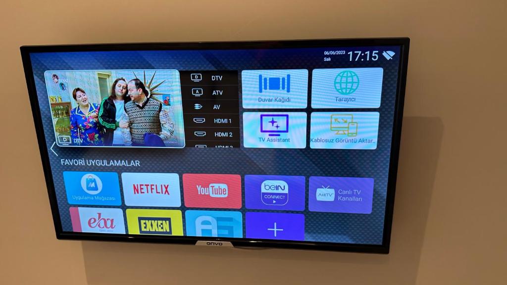 a television screen with a bunch of icons on it at Mar Boutique Apartment in Istanbul