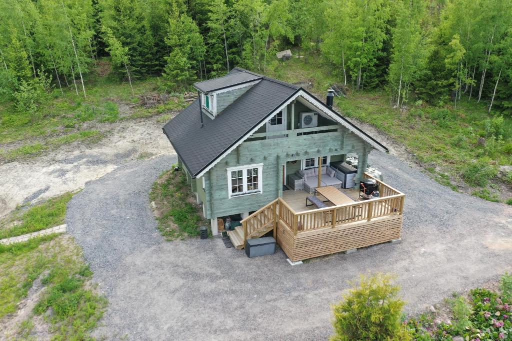 an overhead view of a house with a deck at Villa Granbacka Raasepori Karjaa Finland in Karjaa